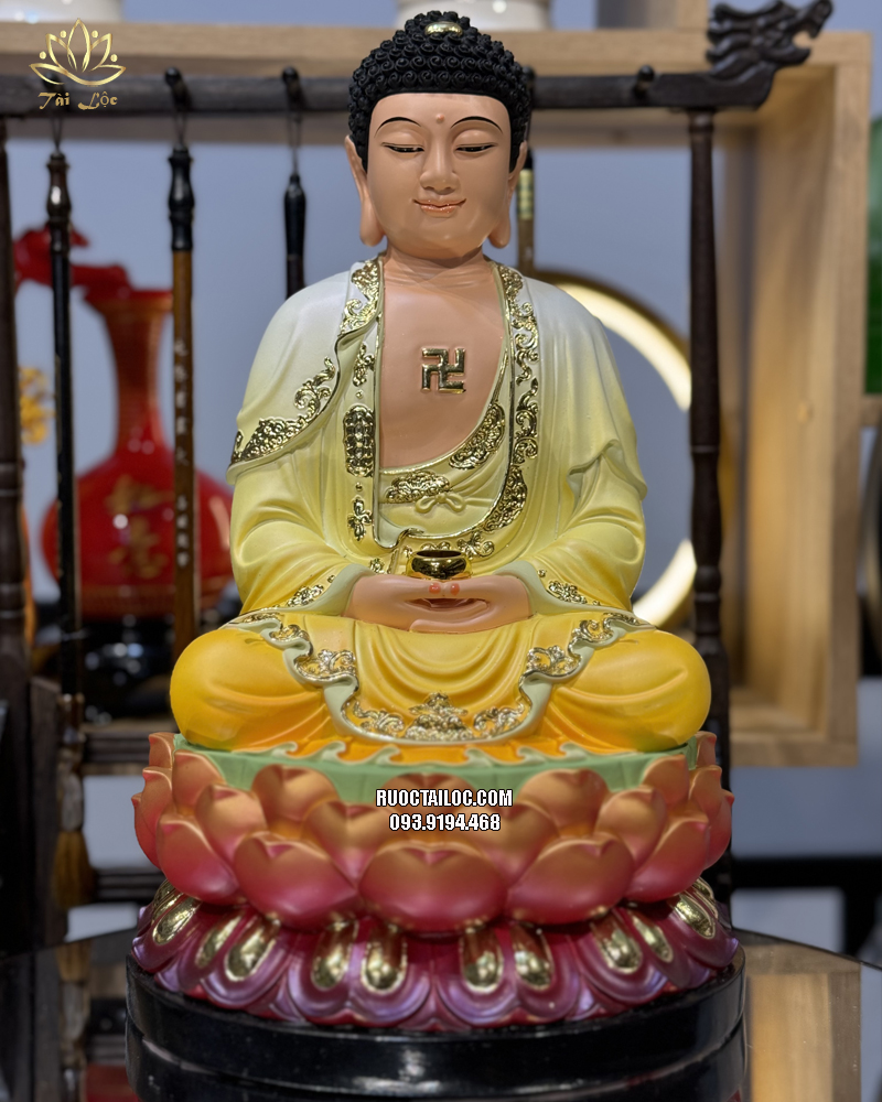 Tượng Phật Dược Sư áo vàng đế sen đỏ bằng composite