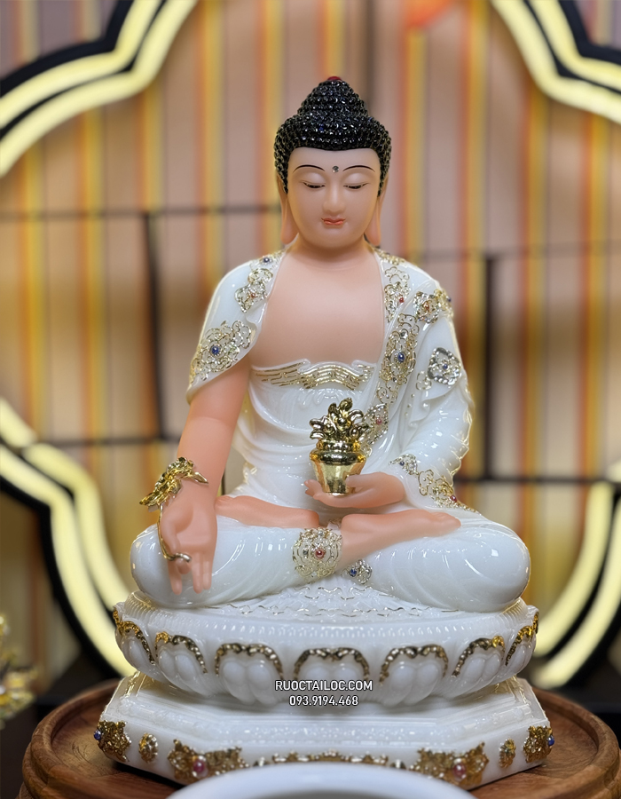Tượng Phật Dược Sư bằng bột đá trắng cầm cây thuốc vàng