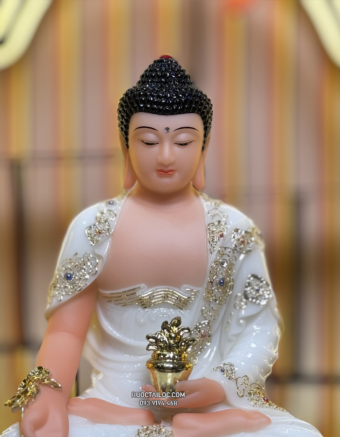 Tượng Phật Dược Sư bằng bột đá trắng cầm cây thuốc vàng