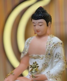 Tượng Phật Dược Sư bằng bột đá trắng cầm cây thuốc vàng