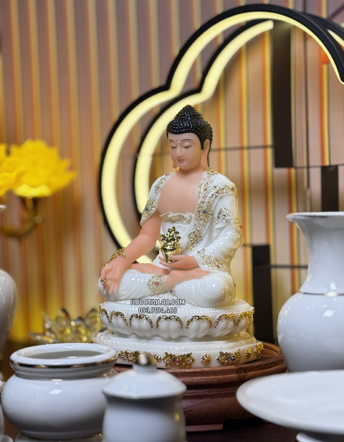 Tượng Phật Dược Sư bằng bột đá trắng cầm cây thuốc vàng