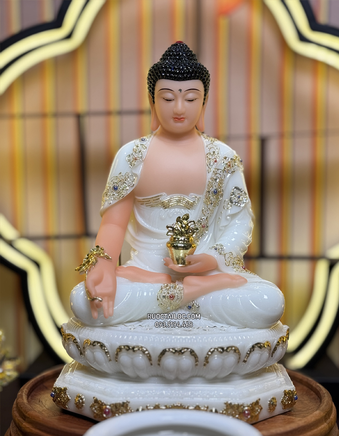 Tượng Phật Dược Sư bằng bột đá trắng cầm cây thuốc vàng