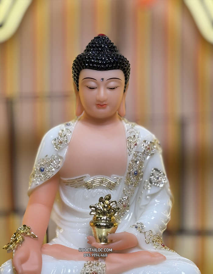 Tượng Phật Dược Sư bằng bột đá trắng cầm cây thuốc vàng