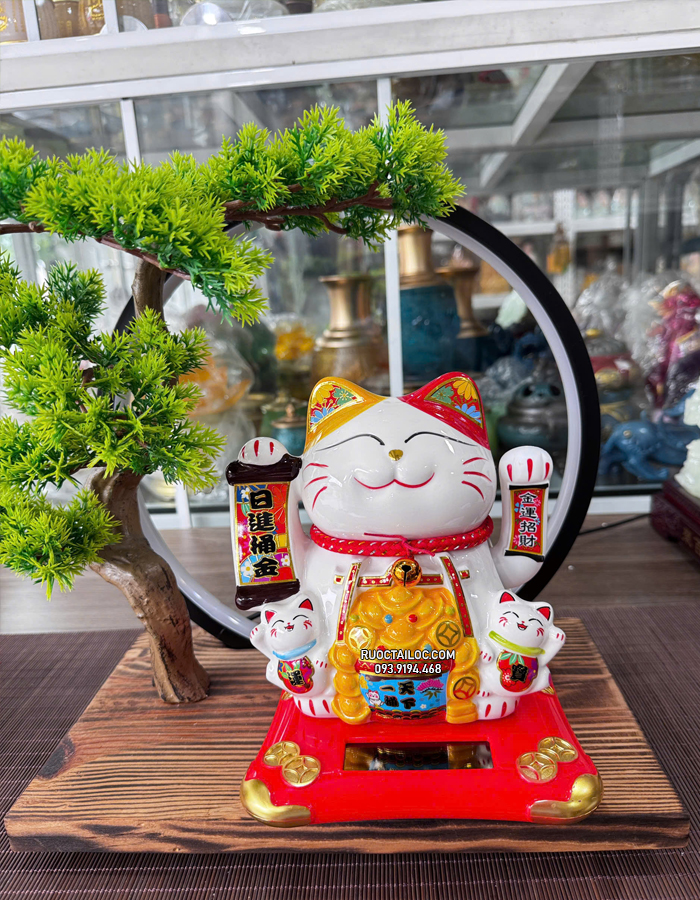 mèo thần tài năng lượng cầm liễn phát tài