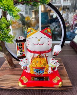 mèo thần tài năng lượng cầm liễn phát tài