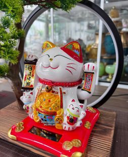 mèo thần tài năng lượng cầm liễn phát tài