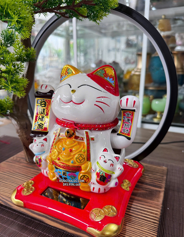 mèo thần tài năng lượng cầm liễn phát tài