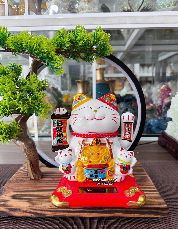 mèo thần tài năng lượng cầm liễn phát tài