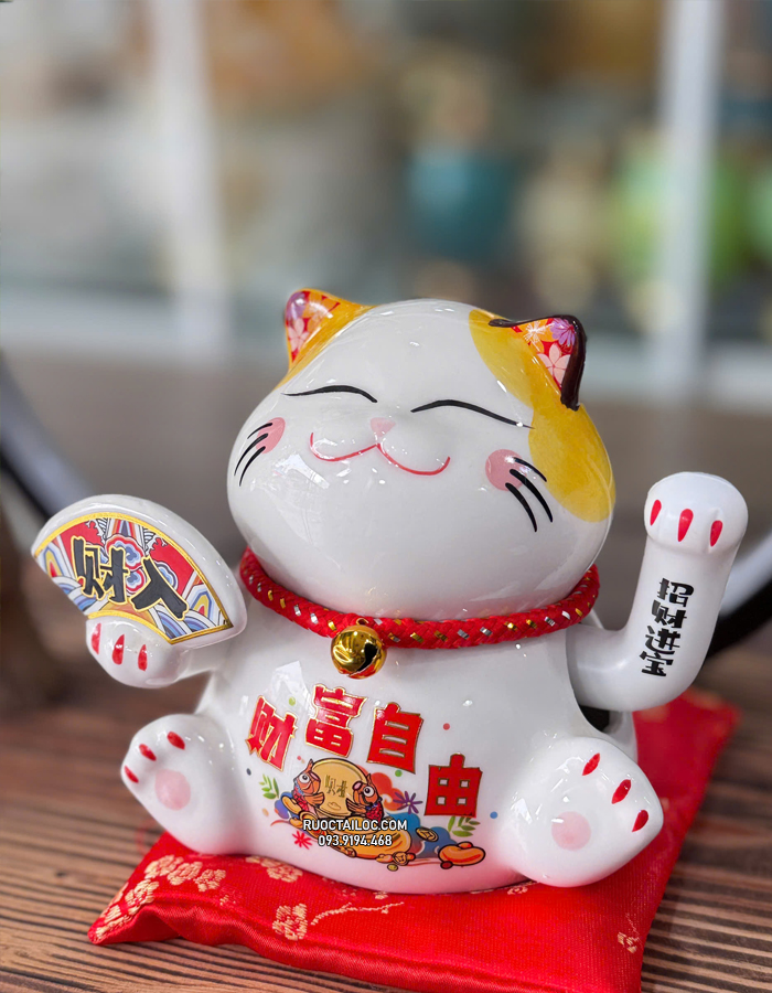 mèo thần tài cầm quạt đẹp